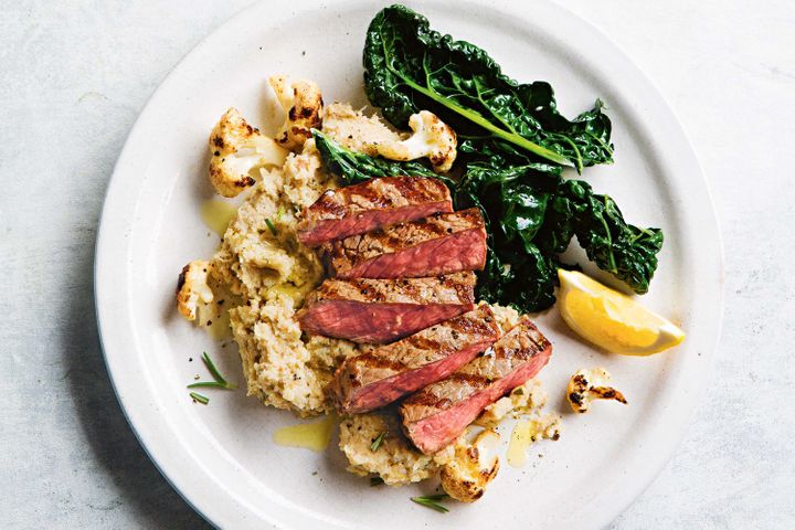 grilled-steak-with-smoky-cauliflower-and-white-bean-mash-106934-1