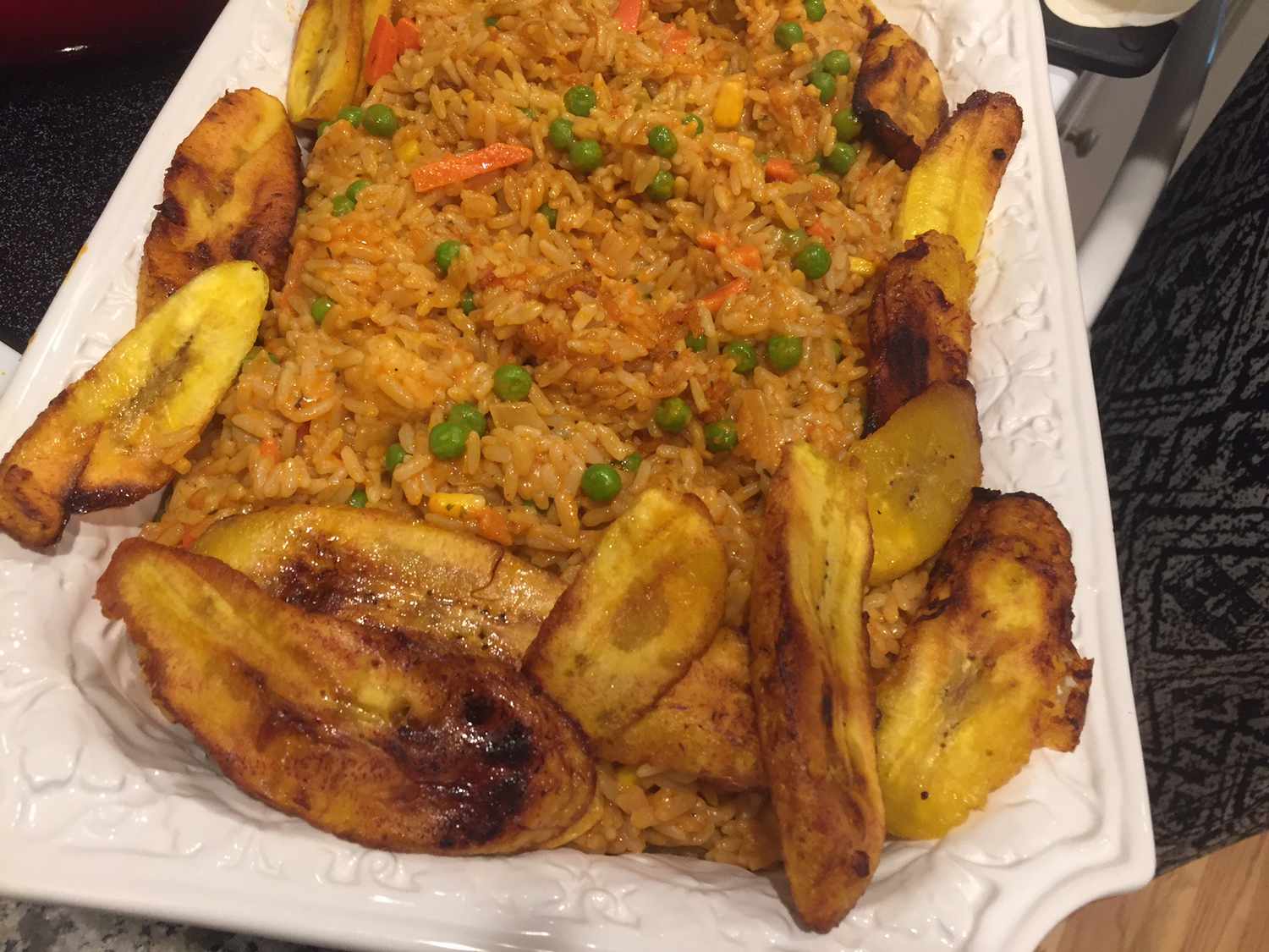 Nigerian Jollof Rice with Chicken and Fried Plantains Recipe