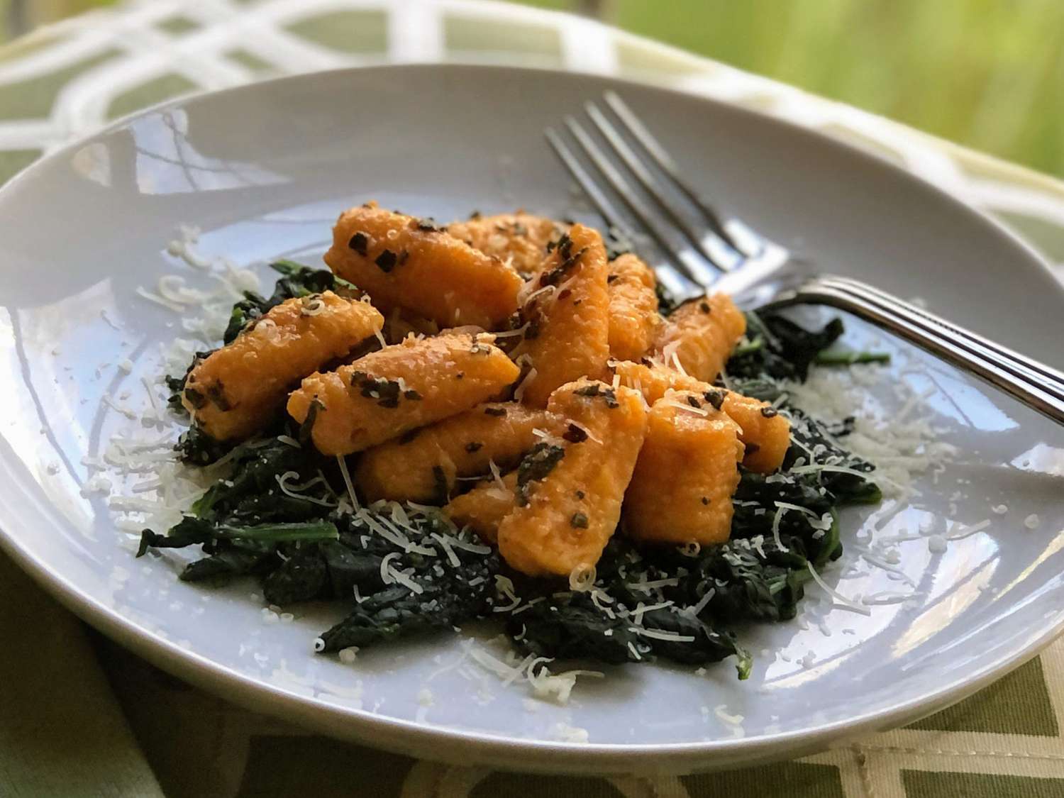 Butternut Squash Gnocchi with Garlic-Sage Butter over Wilted Spinach