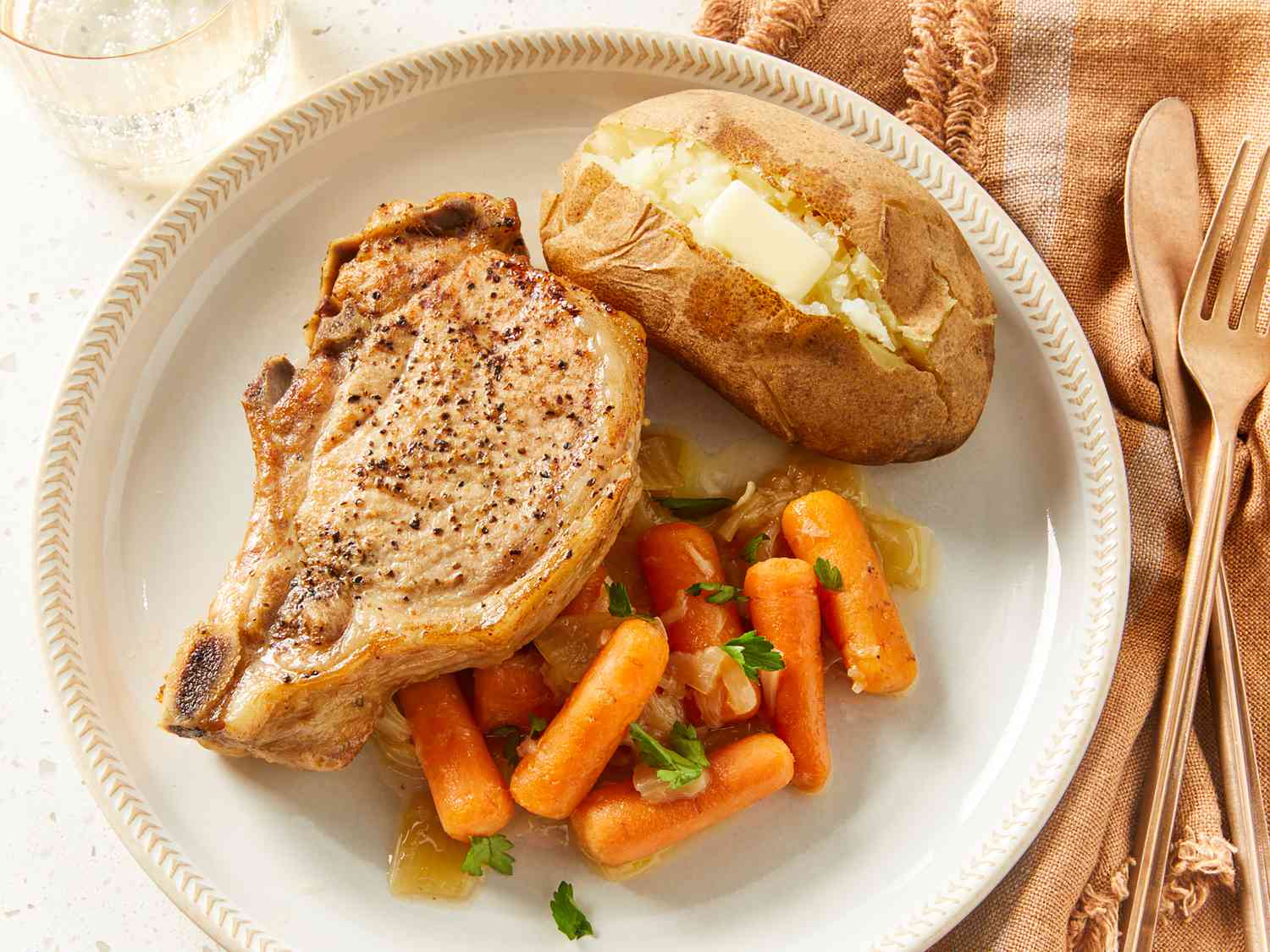 Pressure Cooker Bone-In Pork Chops, Baked Potatoes, and Carrots Recipe