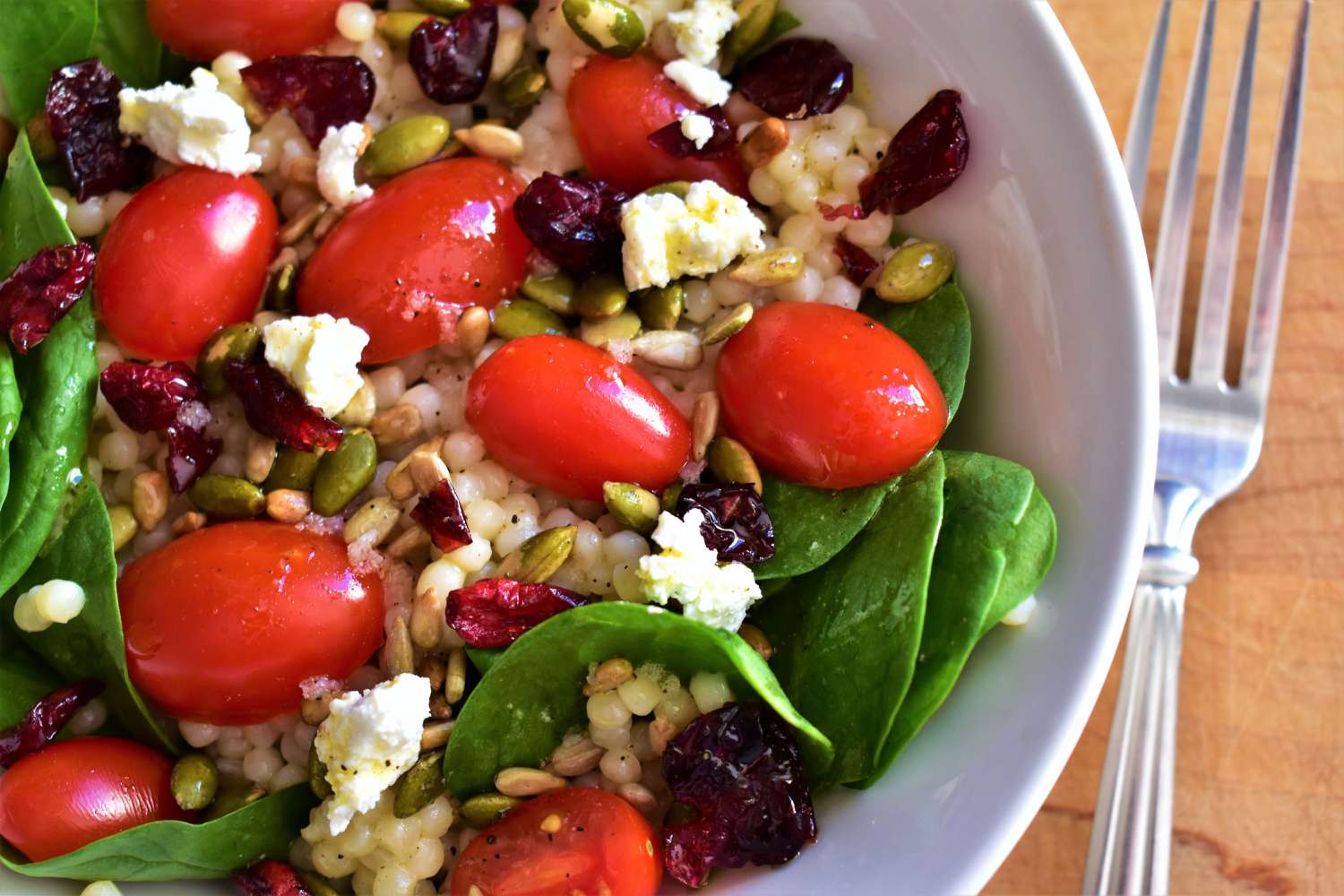 Couscous Salad with Kale, Tomatoes, Cranberries, and Feta Recipe