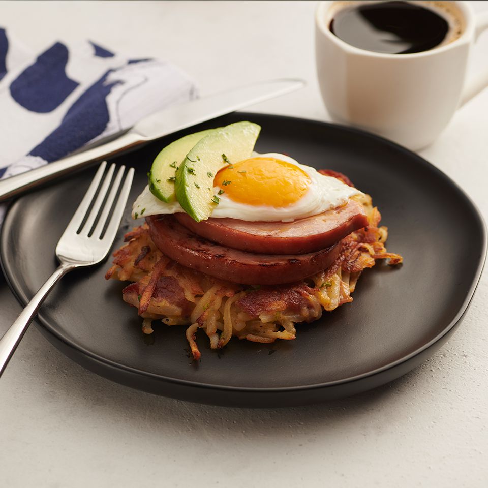 Bacon Potato Cakes with Ham Steak, Egg, and Sliced Avocado Recipe